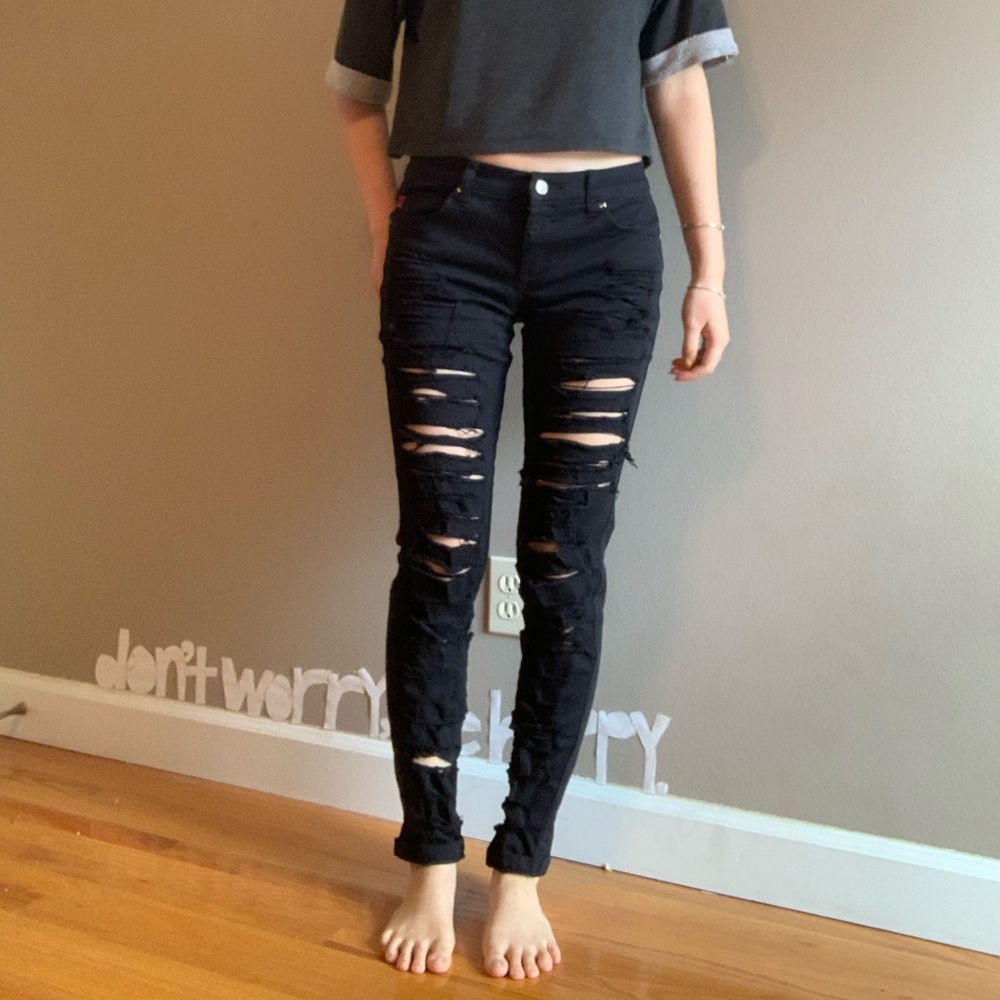 Shredded/ripped black jeans